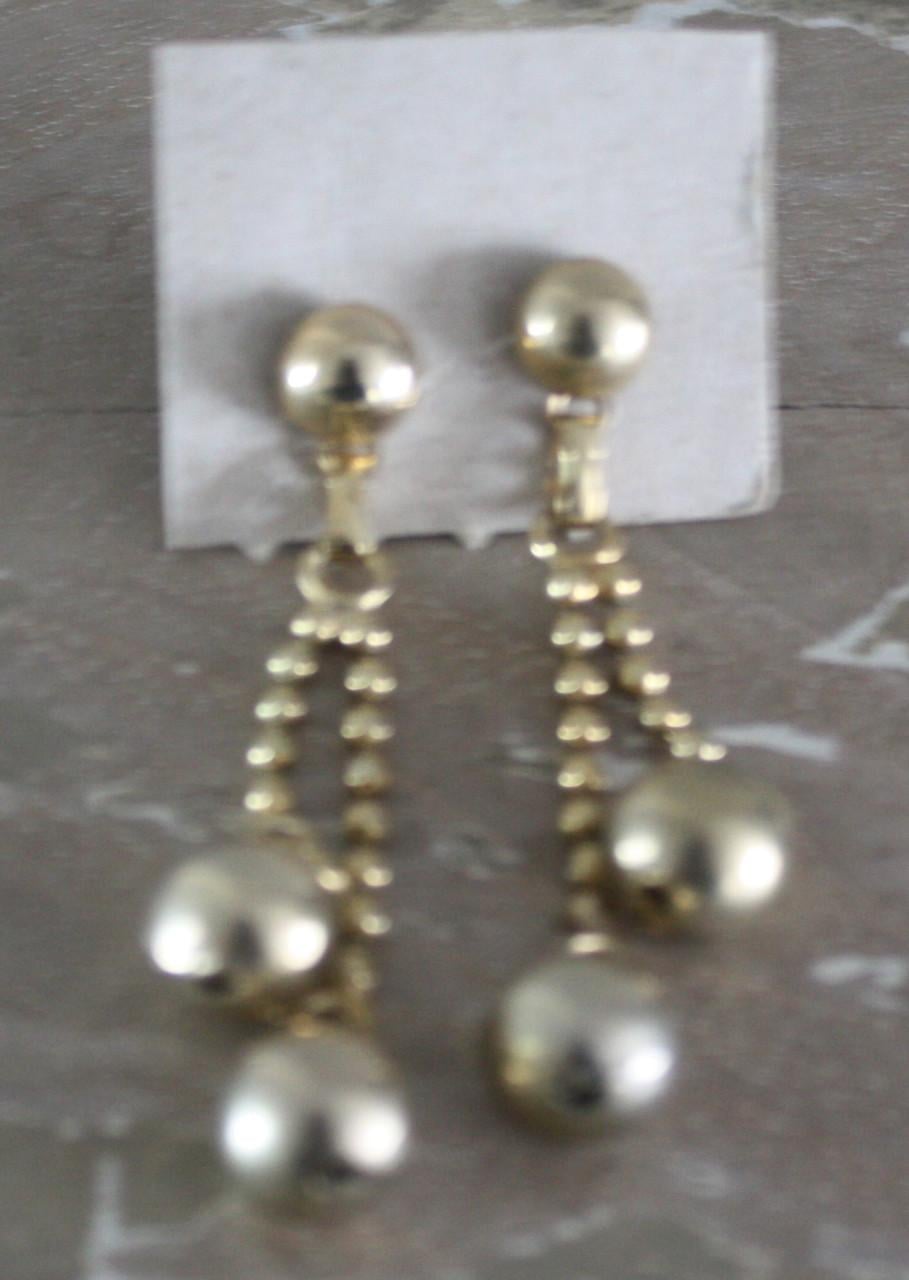 Goudkleurige oorstekers