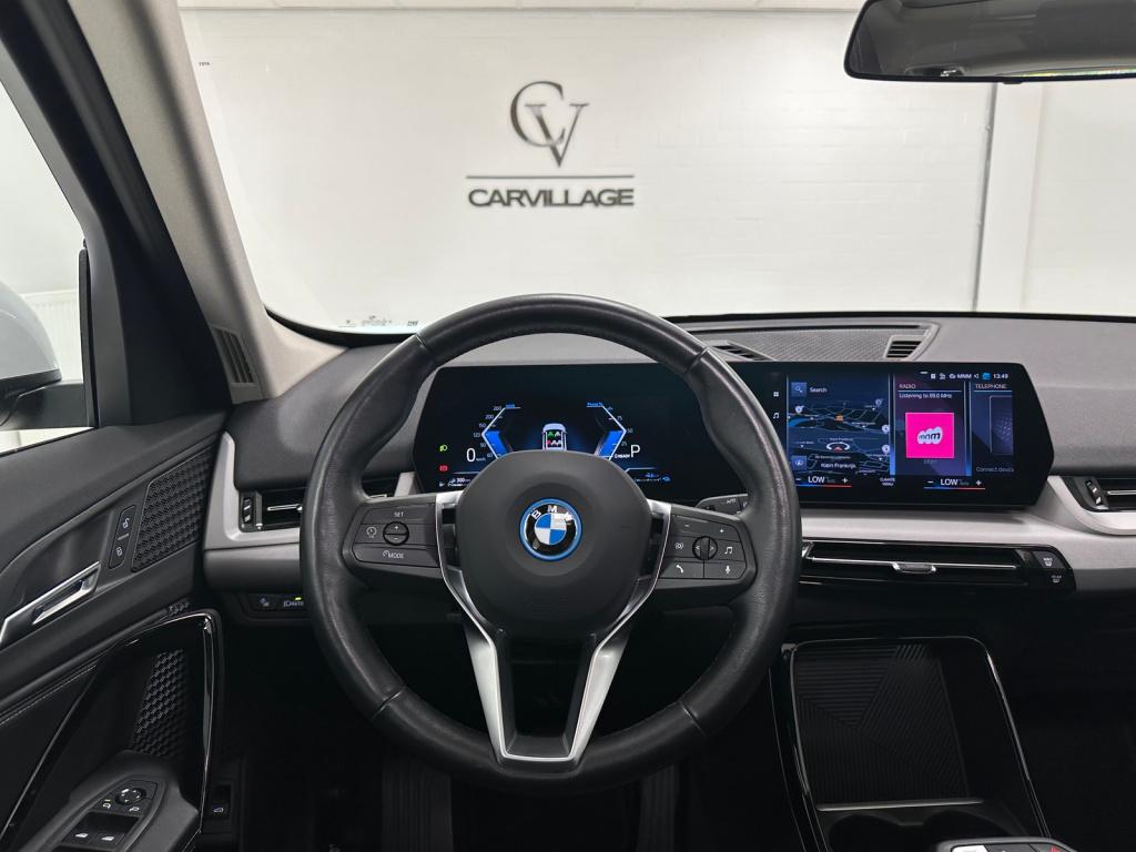 BMW X1 xdrive30e luxury | trekhaak | panoramadak | adaptief cc. |