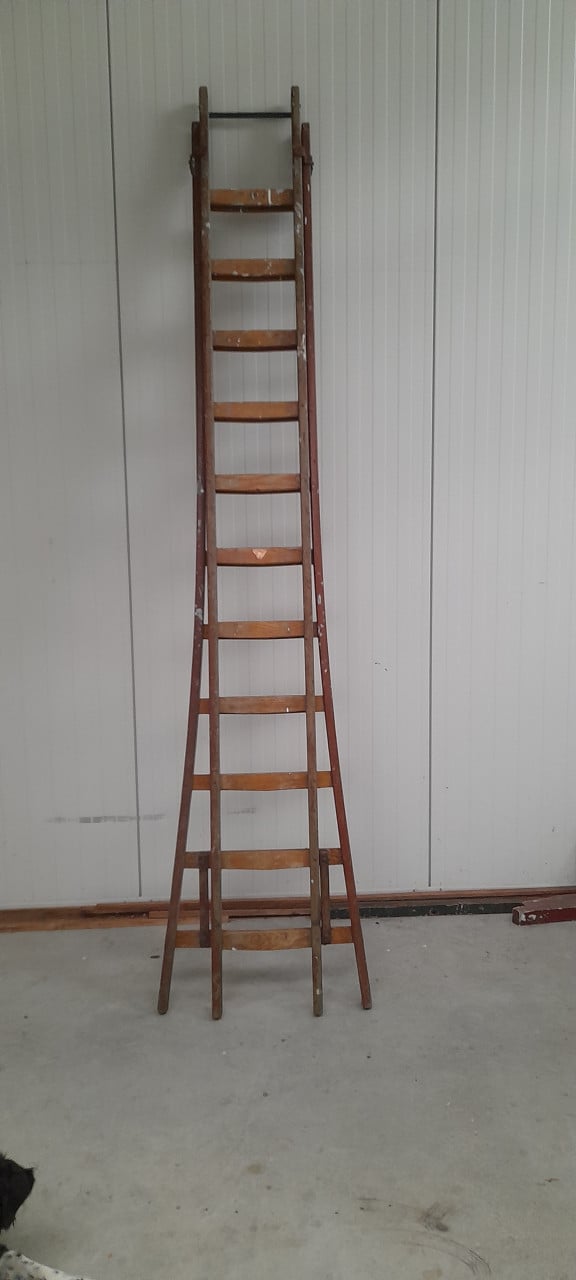Houten schuifladder.