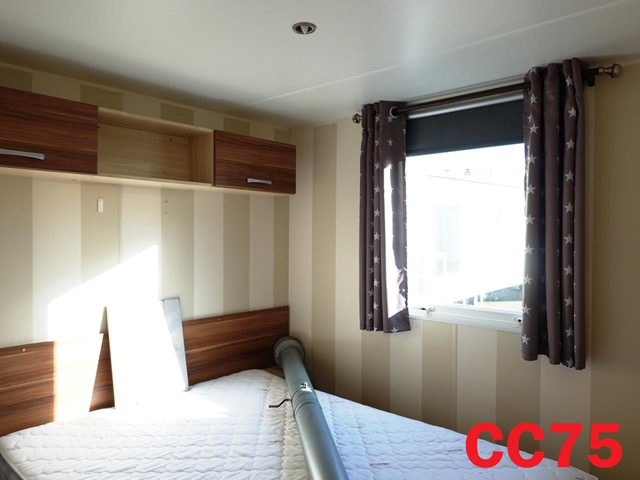 Compact IRM chalet met middenkamer, 2 slaapkamers  en dubbel glas te koop