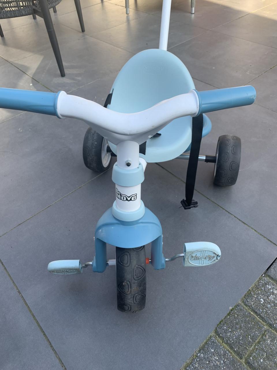 Driewieler met duwstang