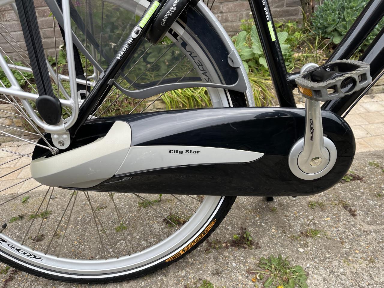 Dames fiets City Star 8 versn trom-rem verlichting Uit de Gazelle familie..