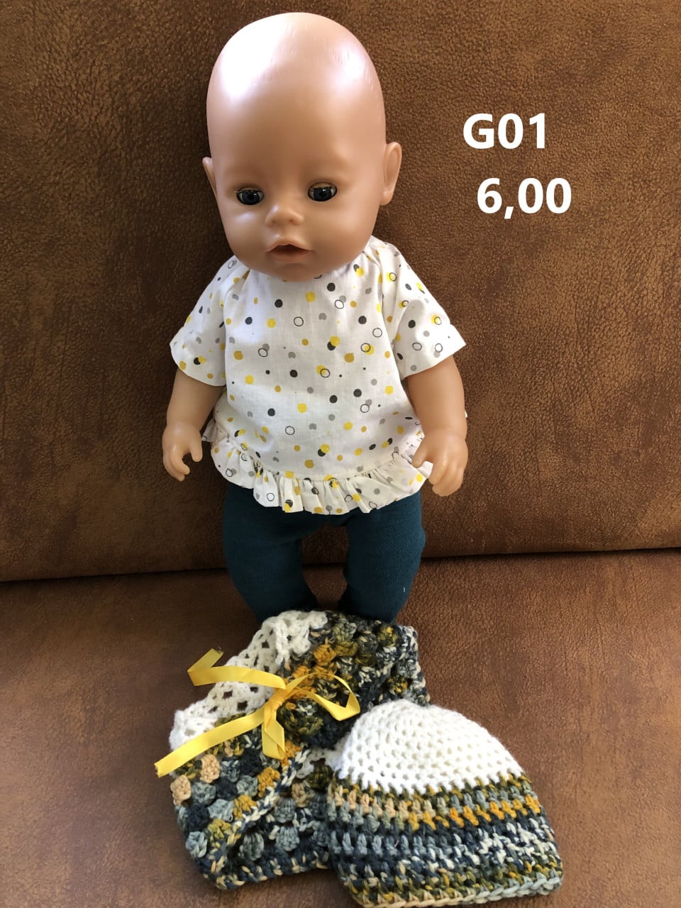 Poppenkleertjes baby born. Set. Opbrengst KiKa.