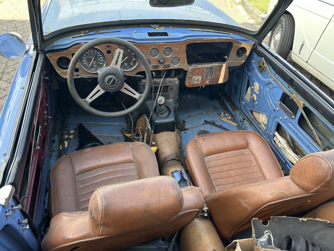 Triumph Herald 1965 en TR6 1973