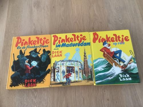 Drie verschillende gebonden boeken van Pinkeltje