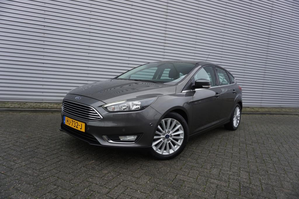 Ford Focus 1.0 titanium edition 1e eigenaar / navi / climate controle / cru