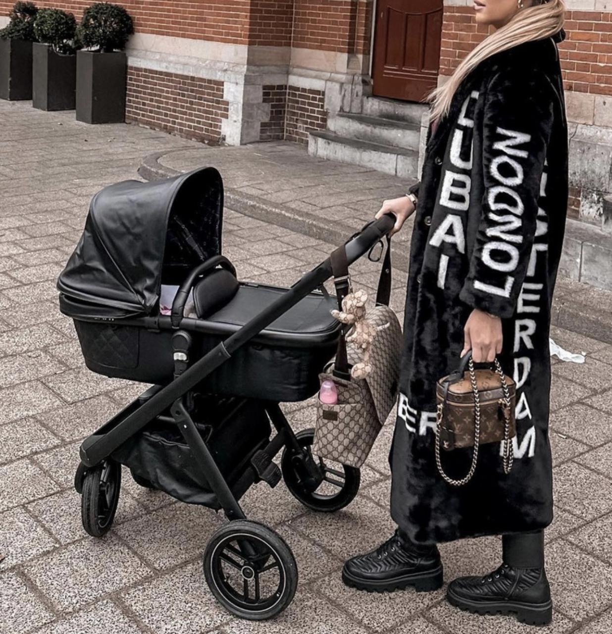 Super nette leren Dubai kinderwagen met alle accessoires!