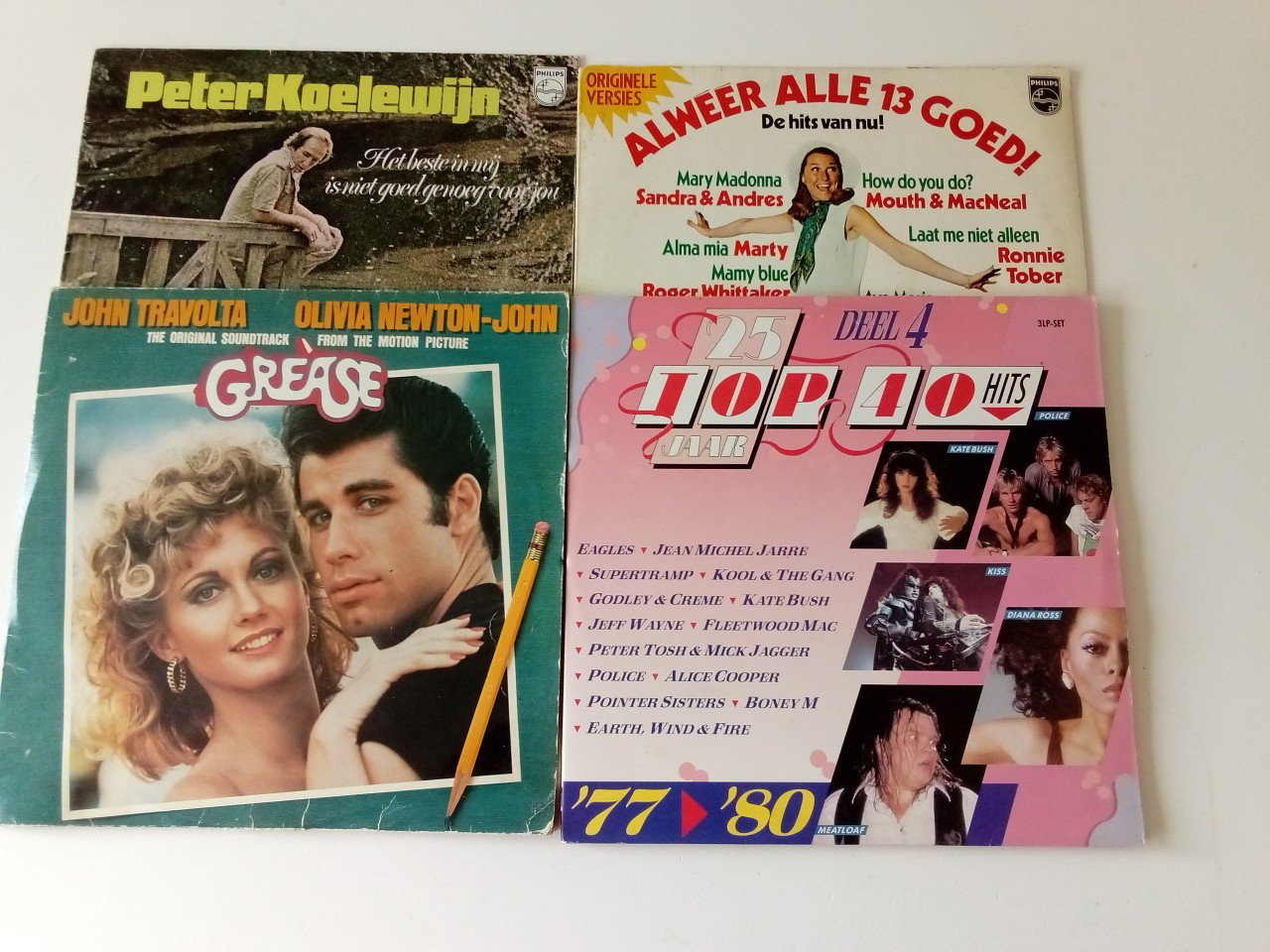 Set van 4 LP's o.a. Grease, Kate Bush, Meatloaf, Diana Ross, The Police