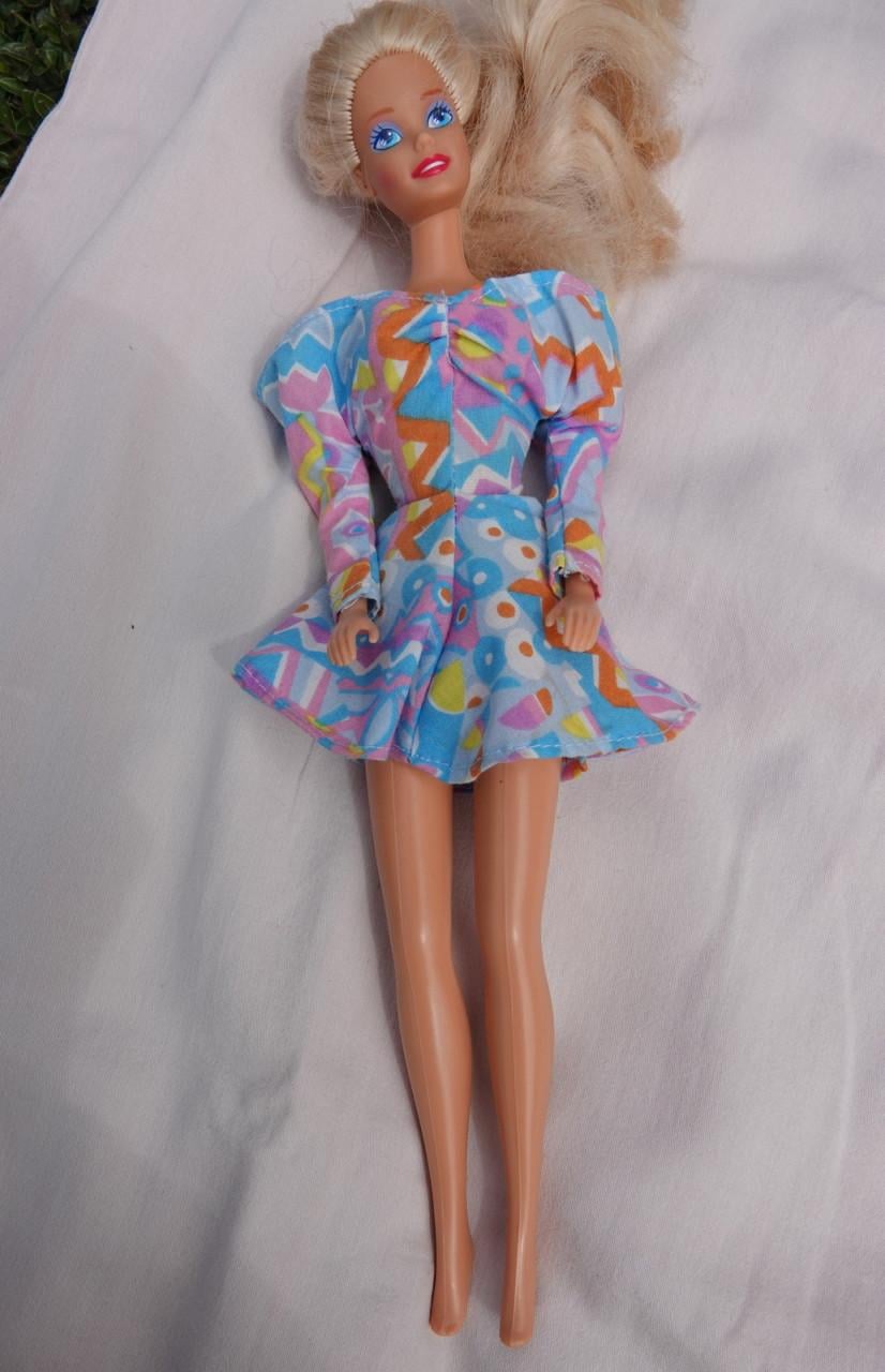 Barbie met kleding