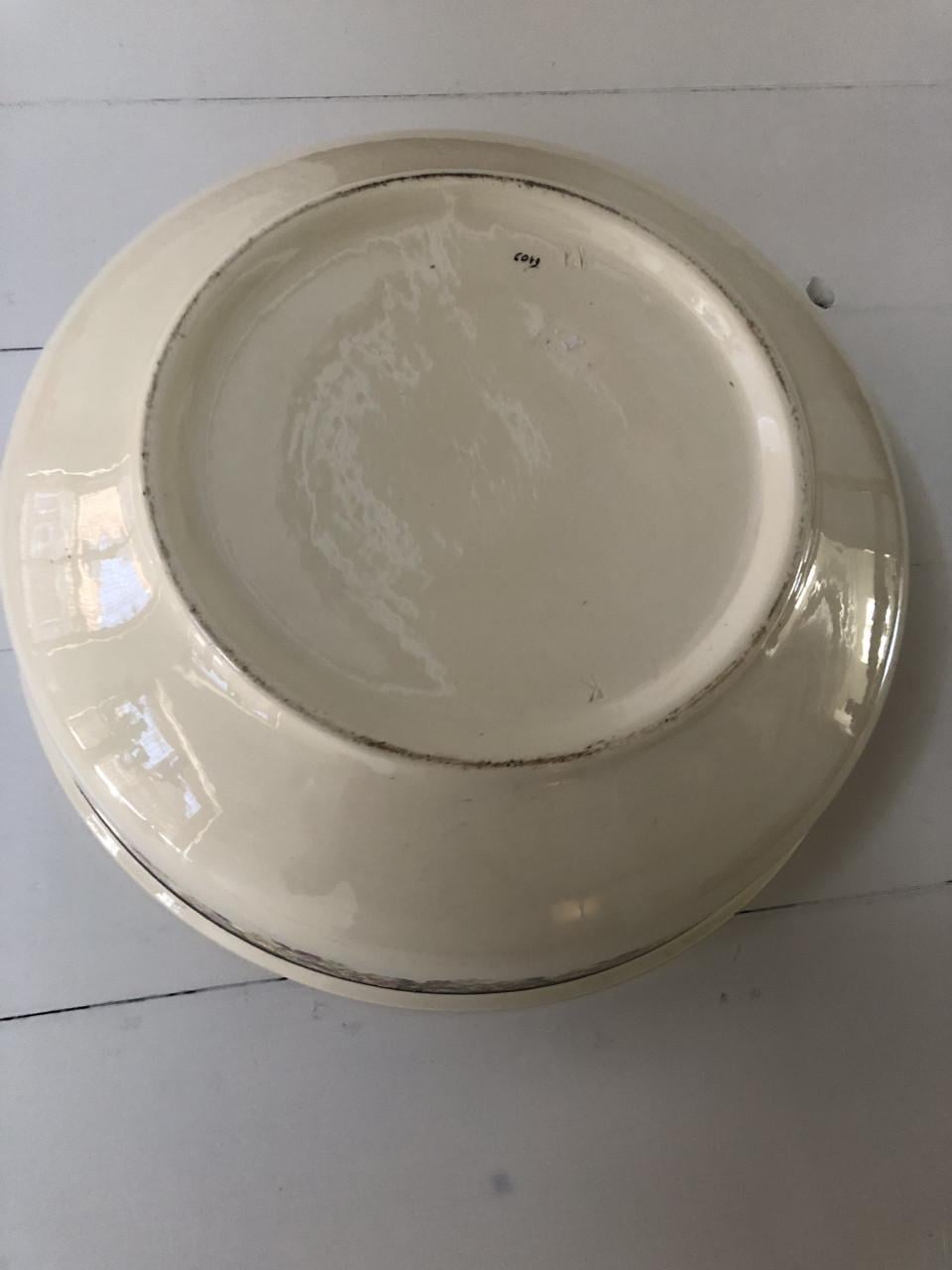 Mooie oude brocante lampet schaal met bloemenrand