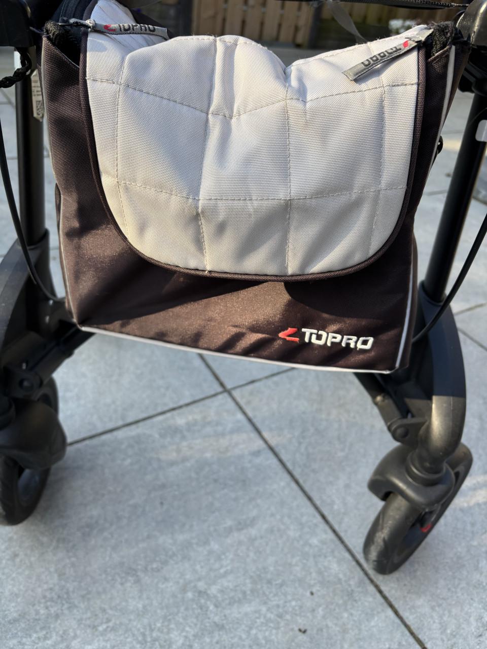 Stevige Topro rollator met zitje, rugsteun en tas