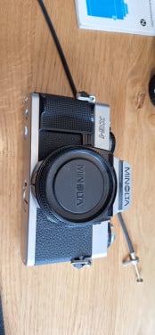 Minolta XG-1 analoge camera met accessoires