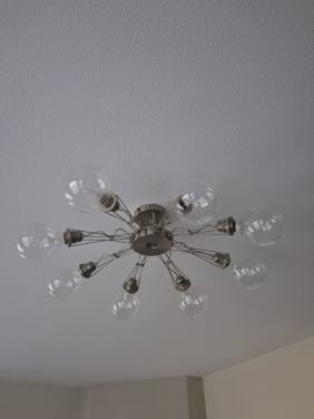 Een design plafondlamp te koop aangeboden