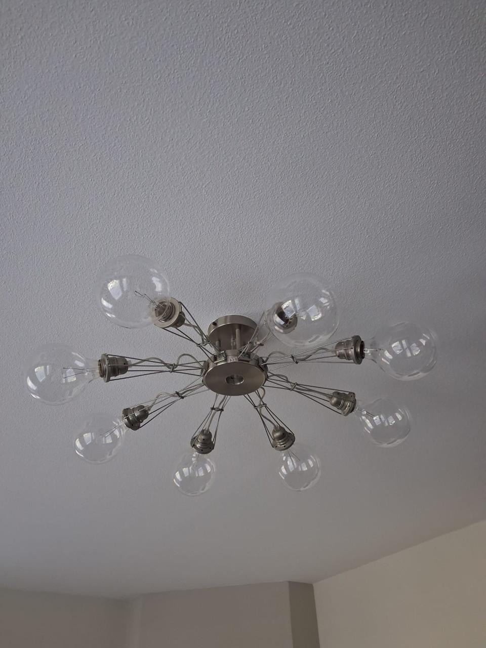 Een design plafondlamp te koop aangeboden