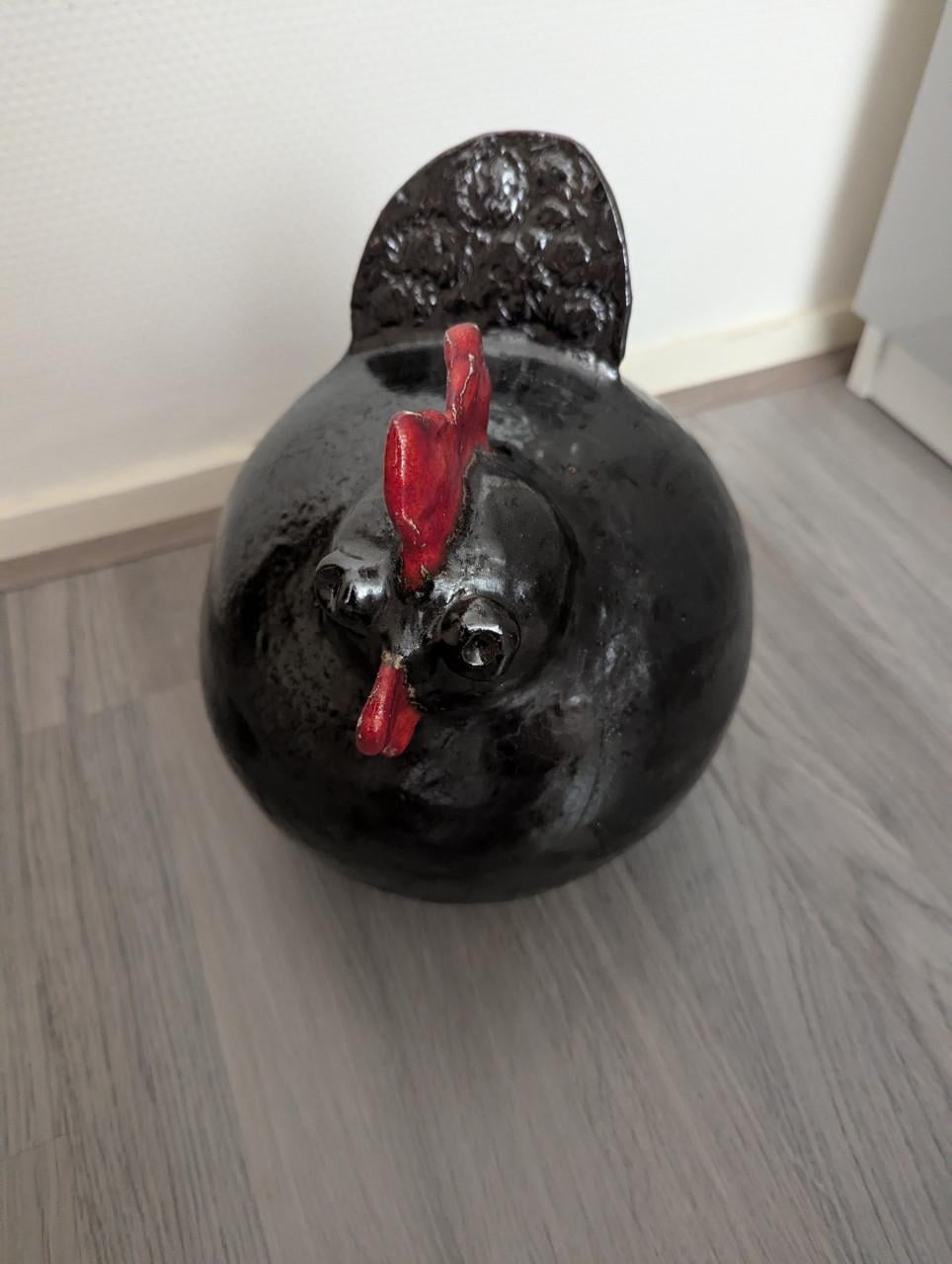 Keramieken kip neeld