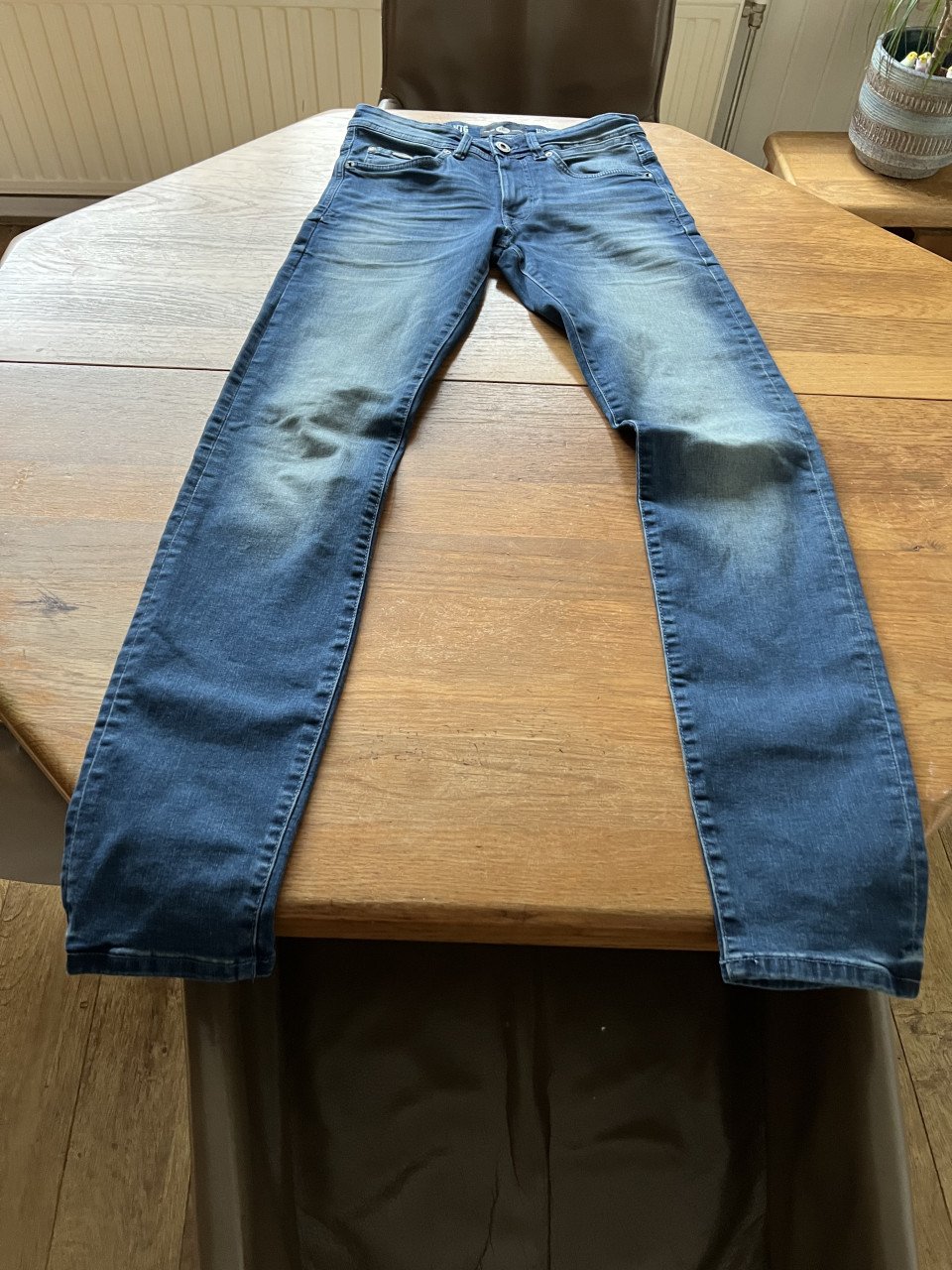 Te koop: petrol jeans