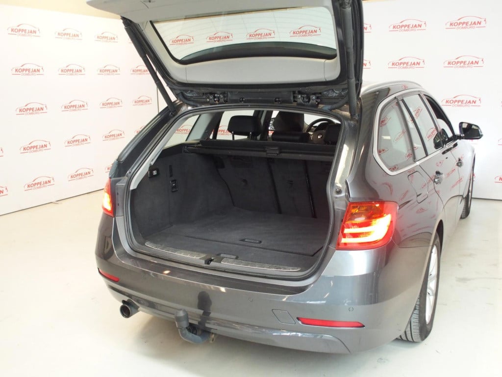 BMW 3-serie touring 320i high executive nl auto, leder, trekhaak