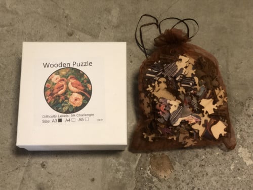 Houten puzzel : mus (- speciale dieren vormpjes )