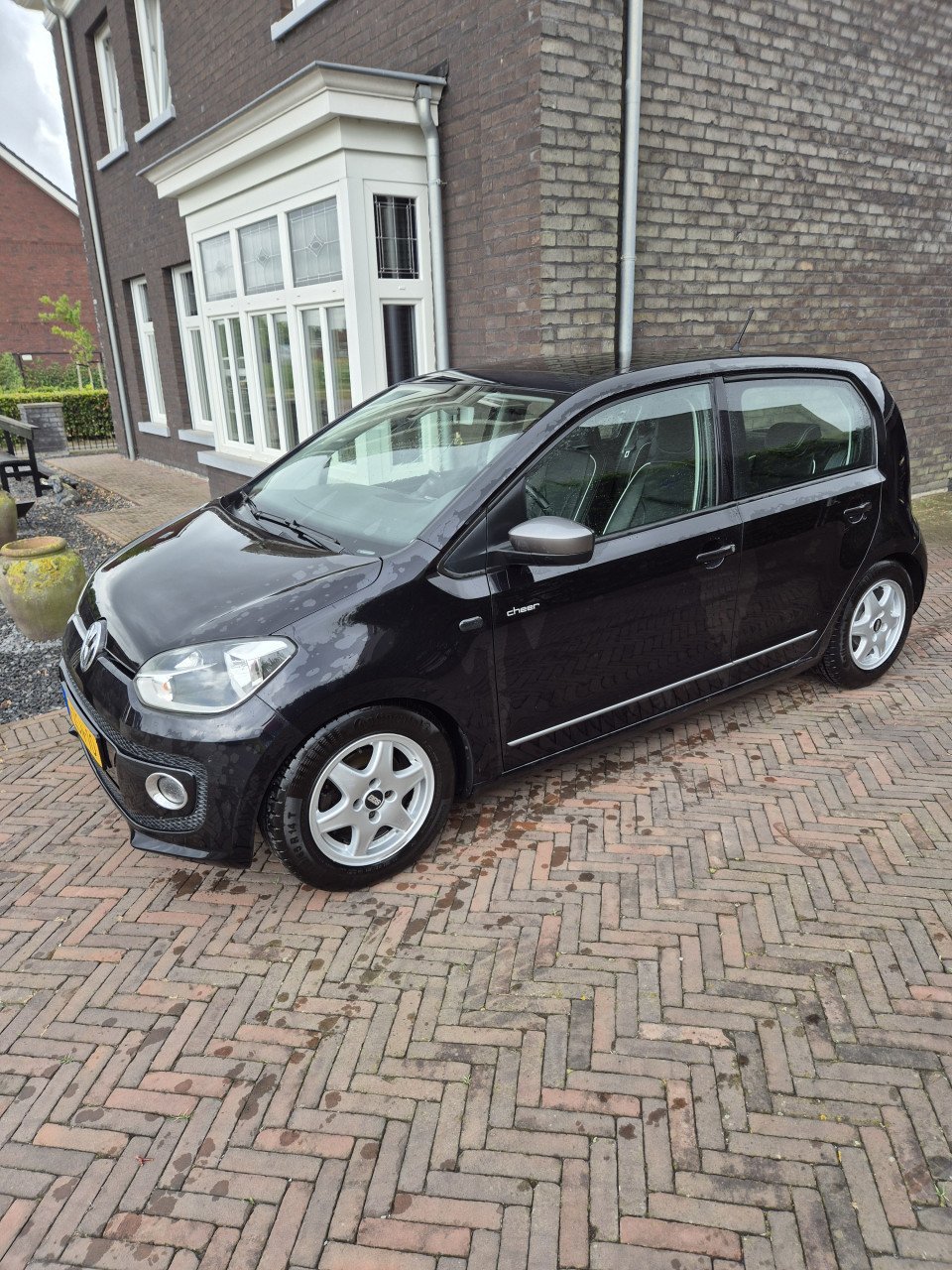 VW High Up BlueMotion 75 pk lederen stoelen