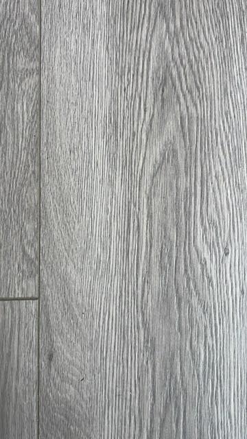 Laminaat Quick step grijs eiken