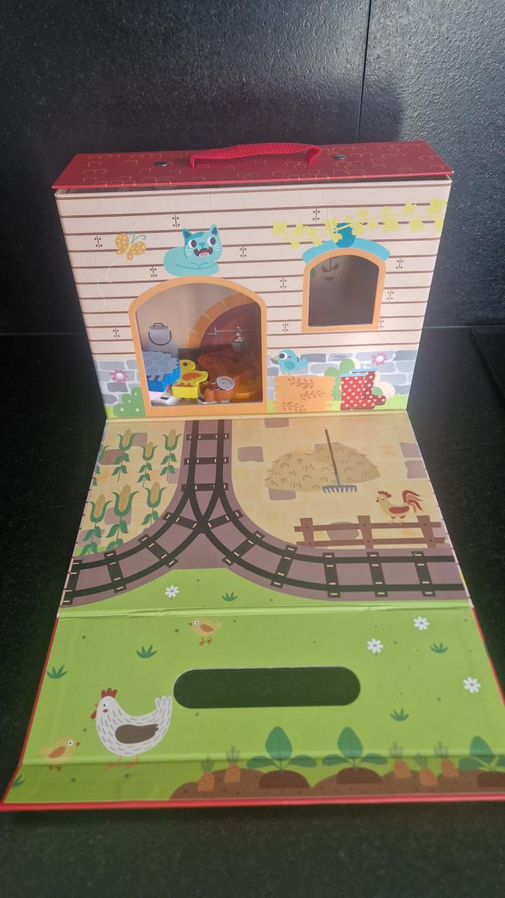 Playtive boerderij speelkoffer met houten figuren.