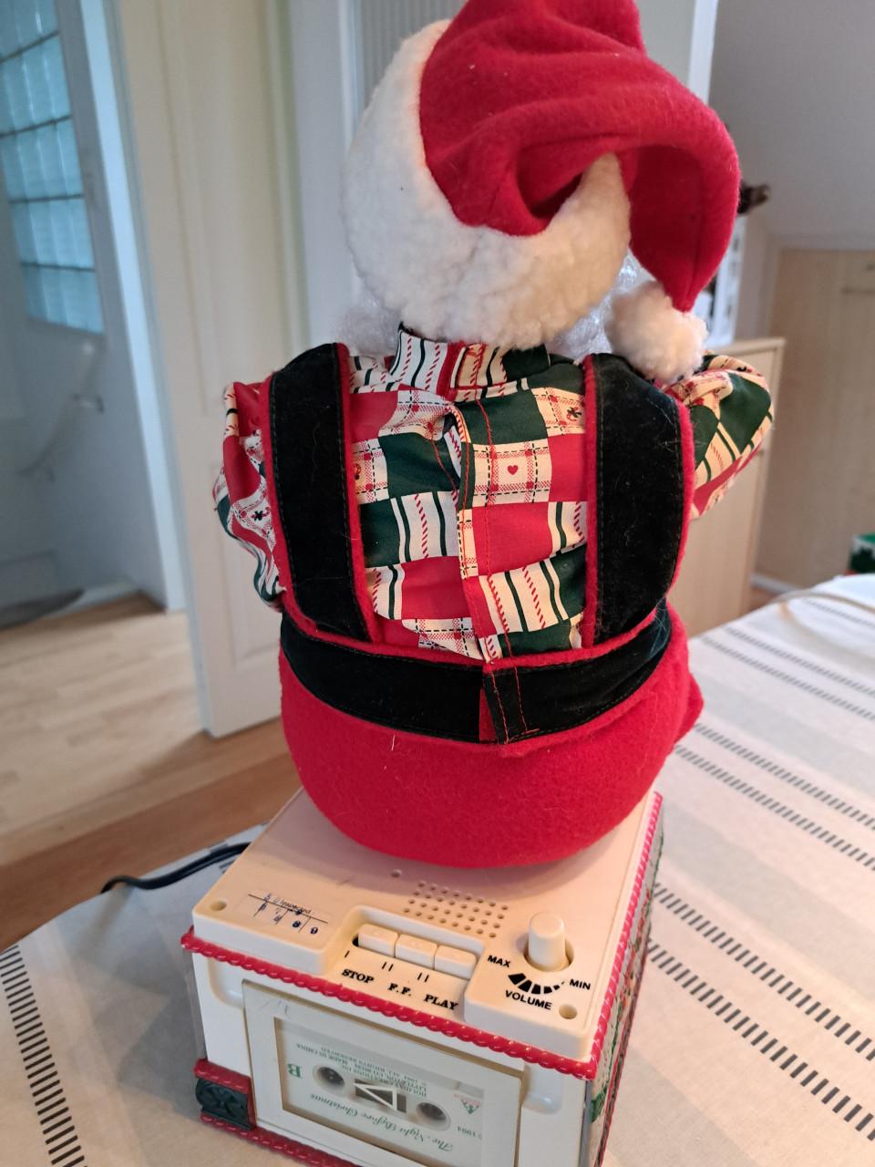 Bewegende kerstman die verhaal verteld