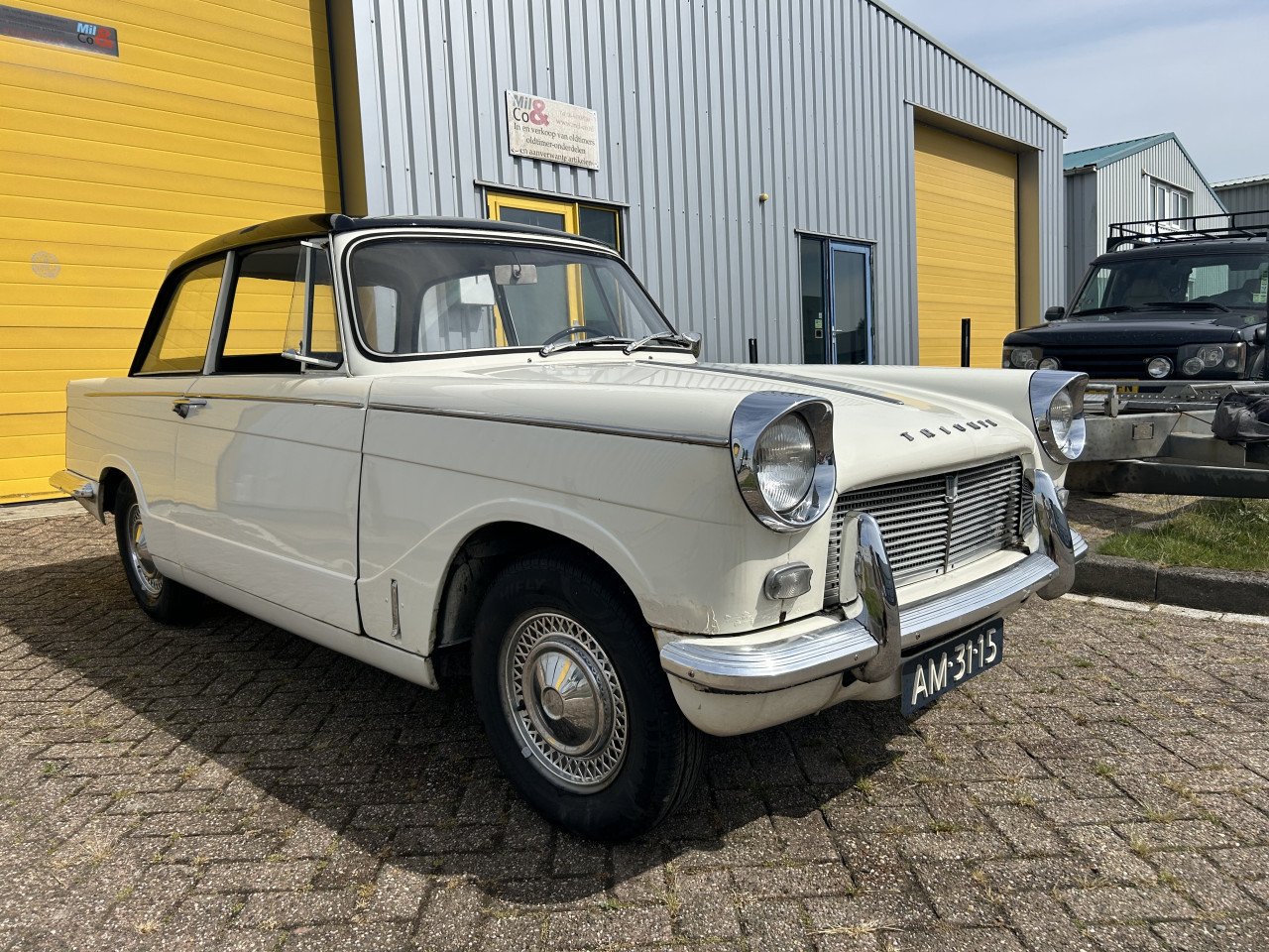 Triumph Herald 1965 en TR6 1973