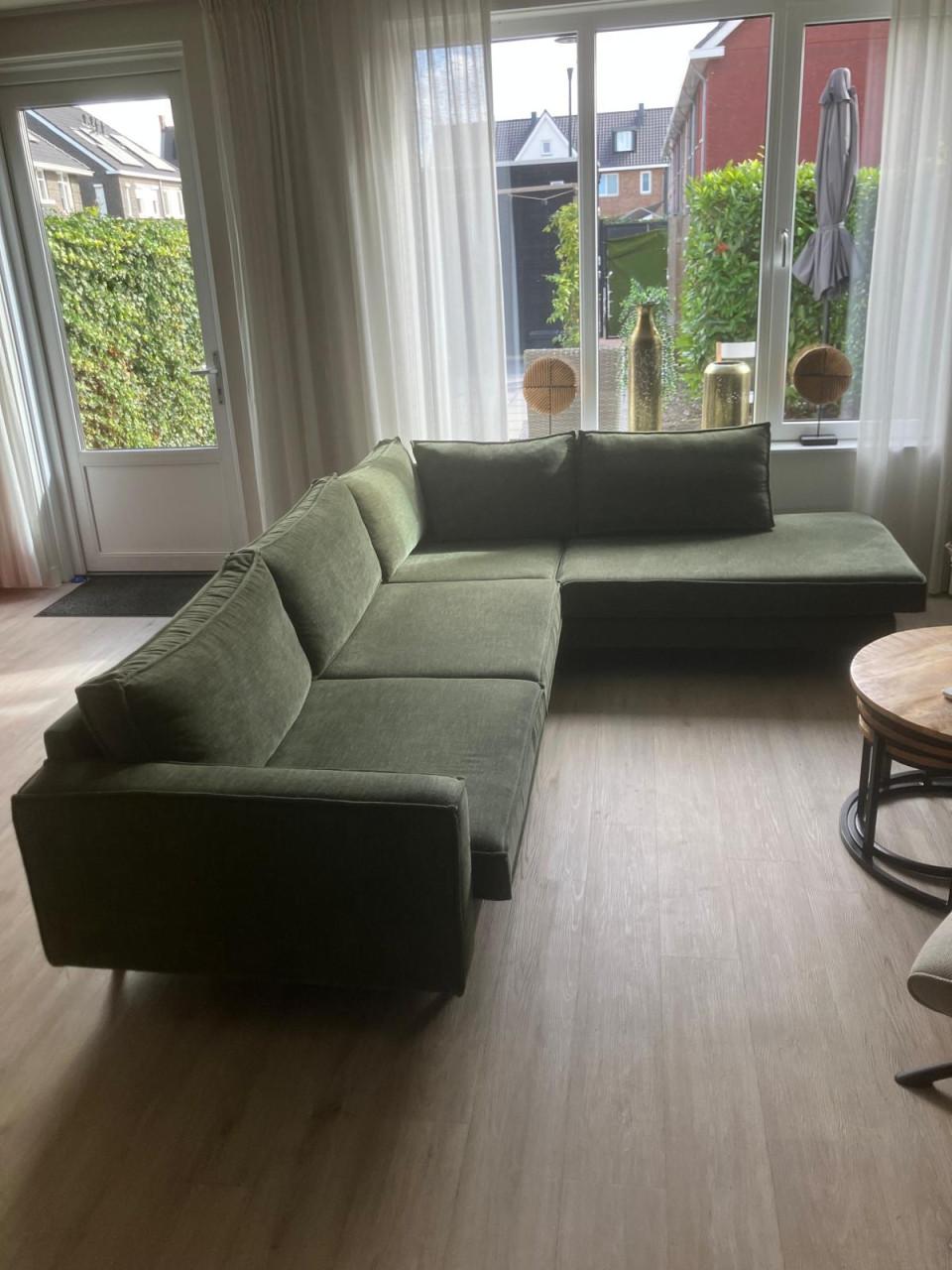 Een mooie groene hoekbank