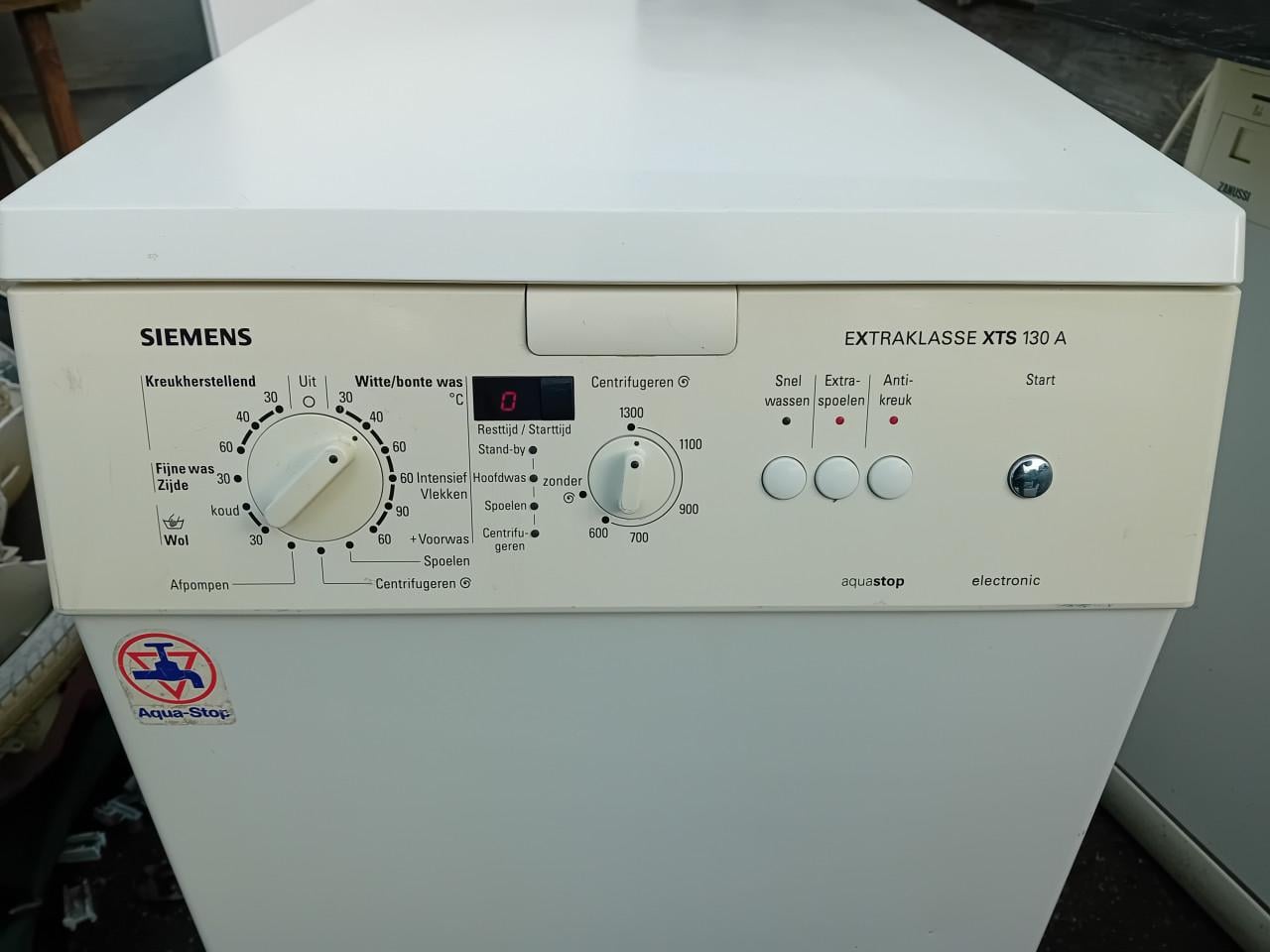 Wasmachine boven lader