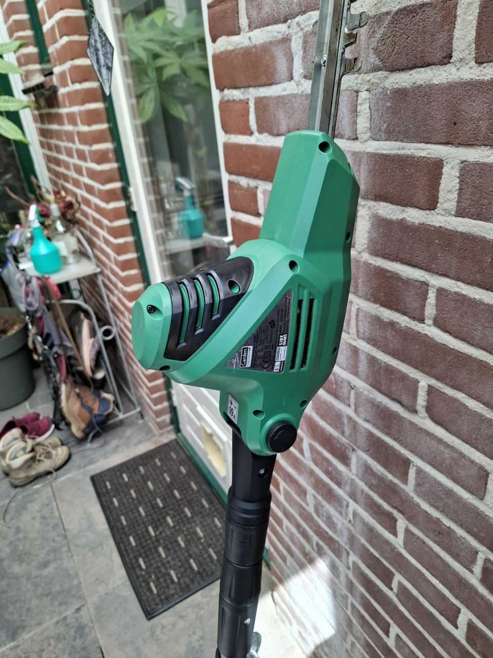 Elektrische stok-heggenschaar