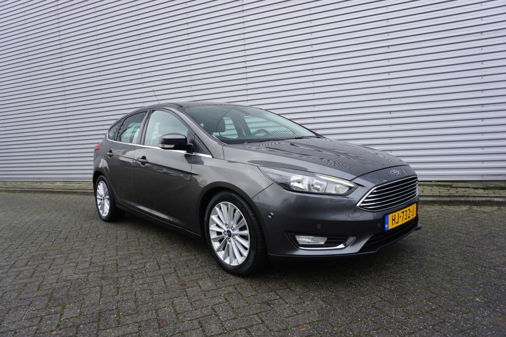 Ford Focus 1.0 titanium edition 1e eigenaar / navi / climate controle / cru