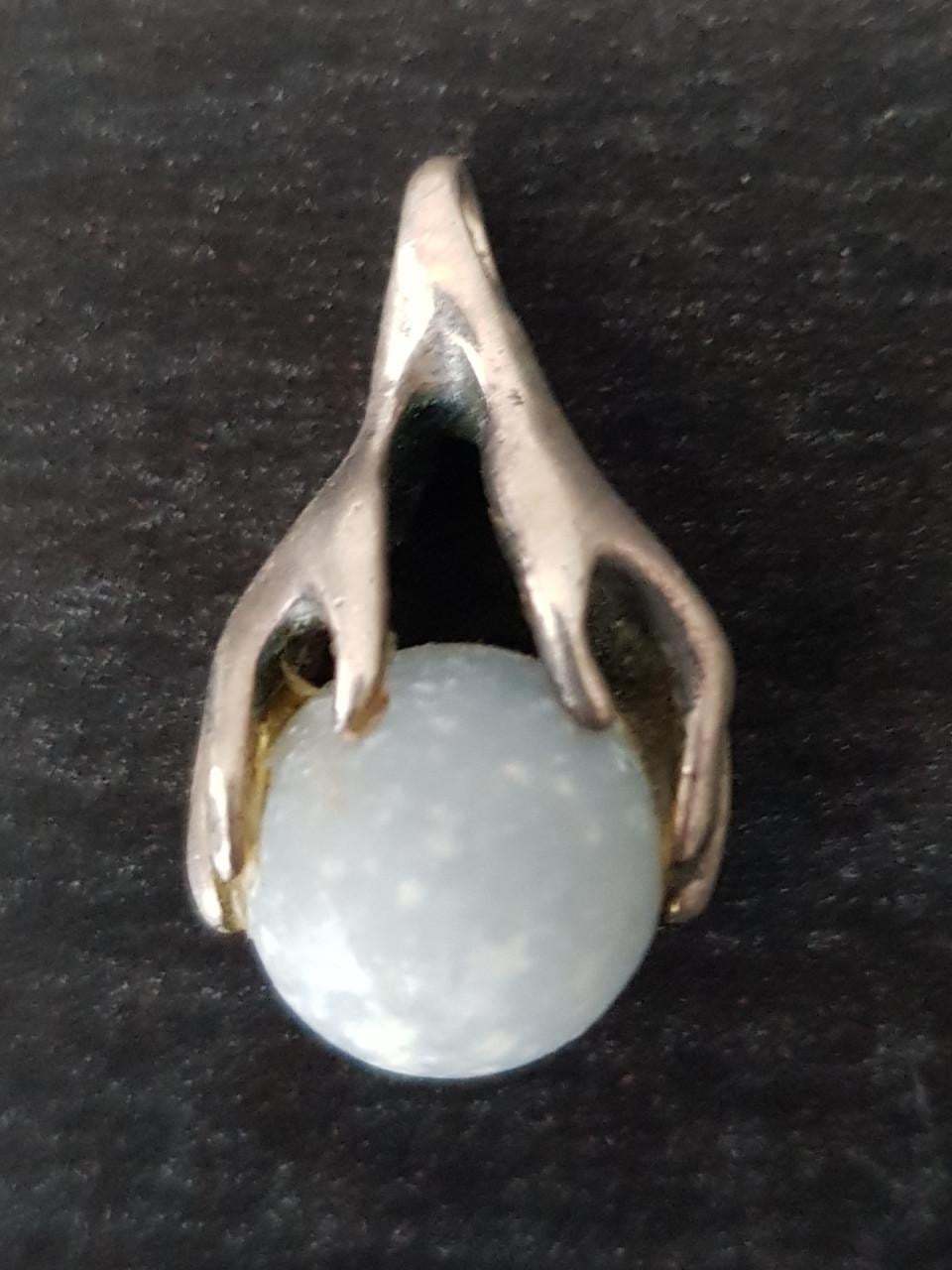 Angeliet hanger tussen healing hands