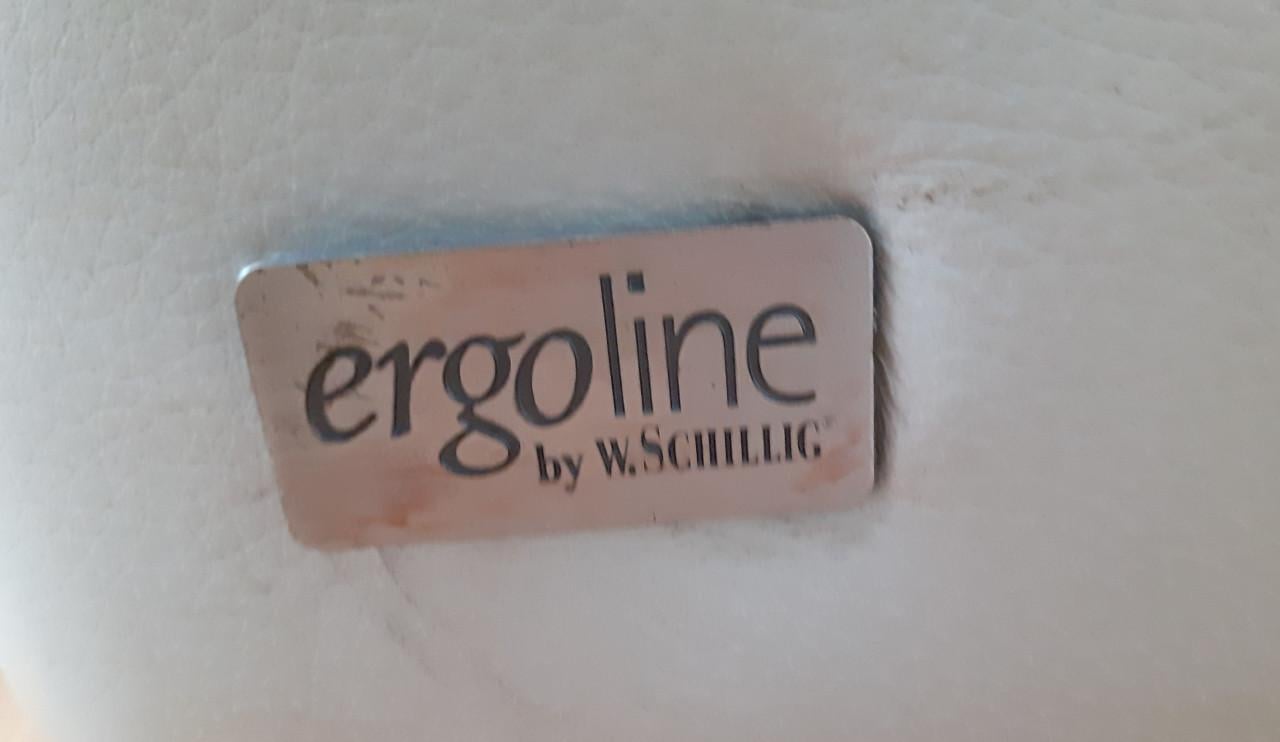 Crème-witte lederen Ergoline tweezitbank en comfortabele Montel fauteuil