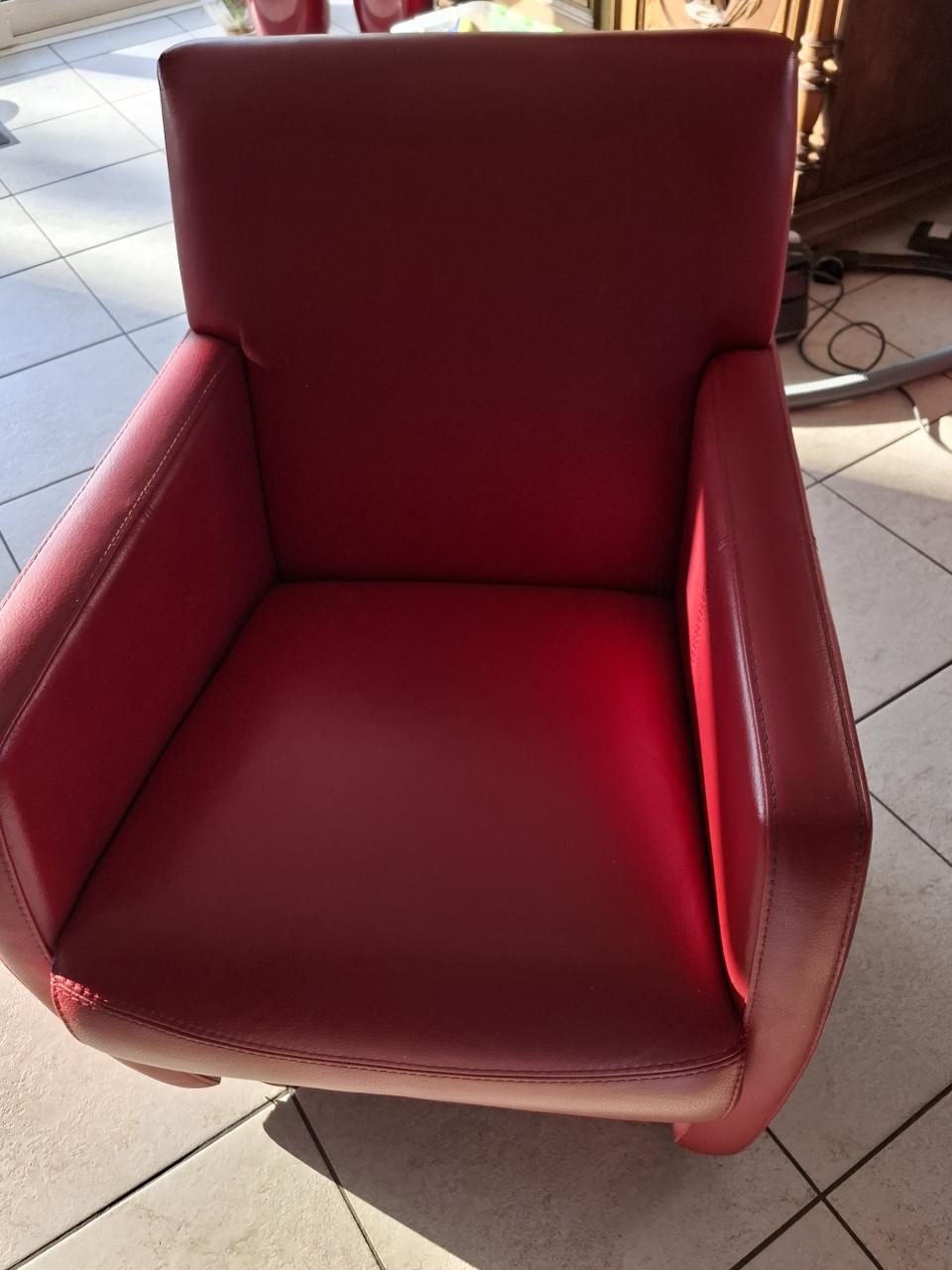 4 leren stoelen fauteuils met armleuning en  wieltjes (henders Hazel)