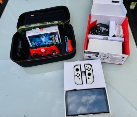 Nintendo Switch Oled (zeer compleet)