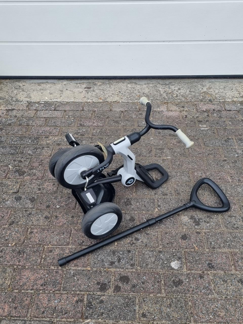 Driewieler met duwstang