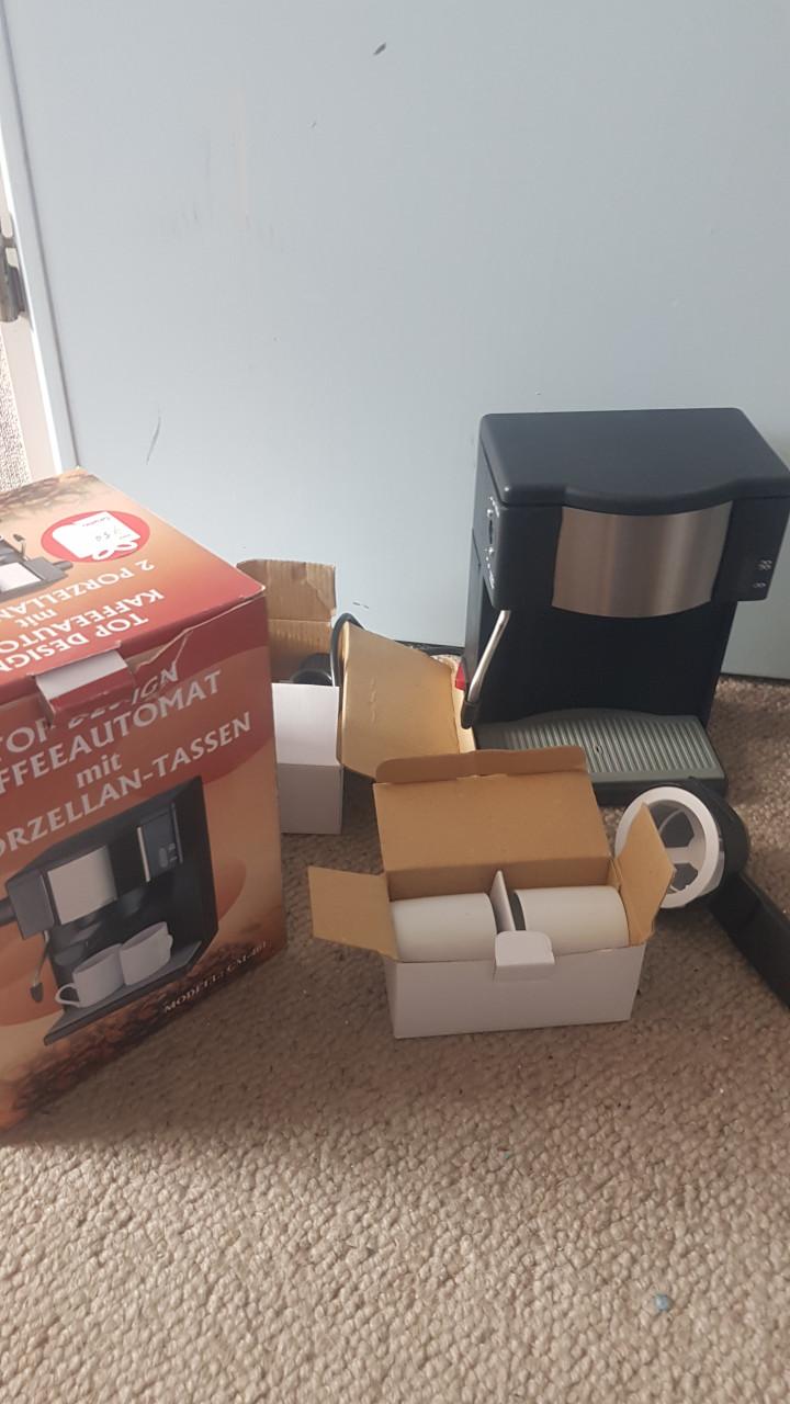 Koffiezetter met 2 kopjes
