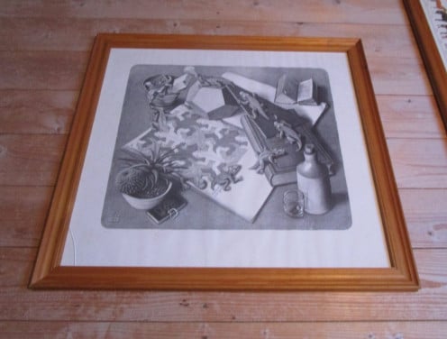 Houtenlijst met Prent van kunstenaar Maurits Cornelis Escher.