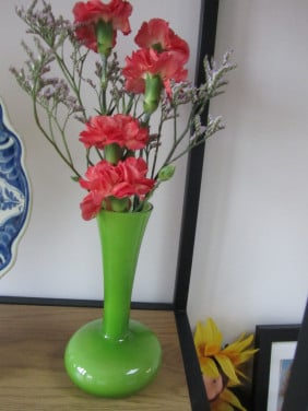 Vaasje van groen glas