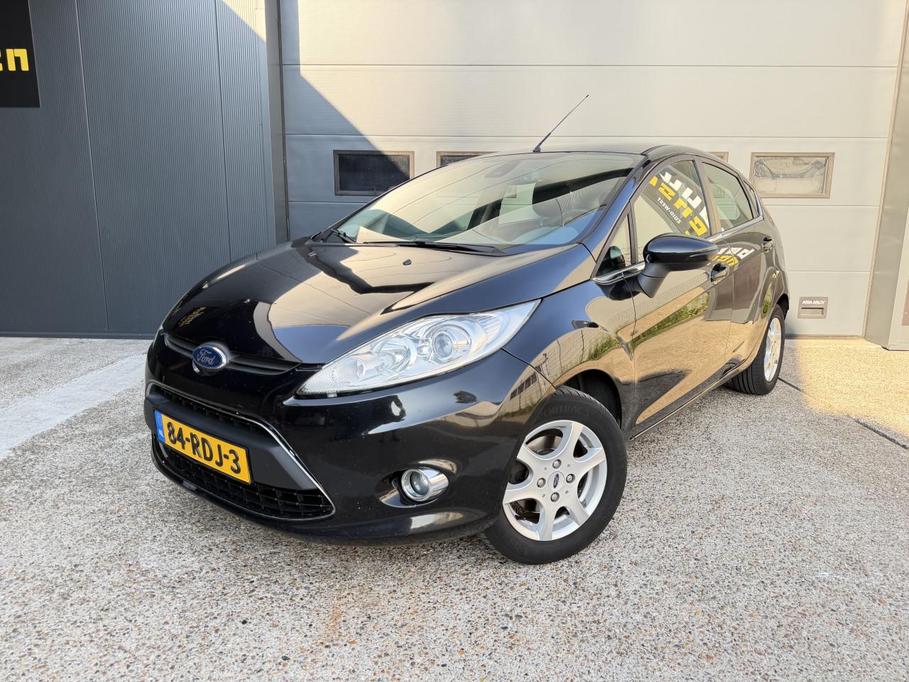 Ford Fiesta 1.25 52KW Titanium 5DRS 2011 Zwart Airco Apk Cruise