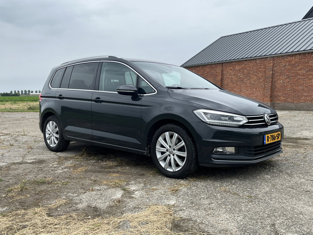 Volkswagen Touran 1.4 TSI 110KW/150PK 7-DSG 2015 Grijs