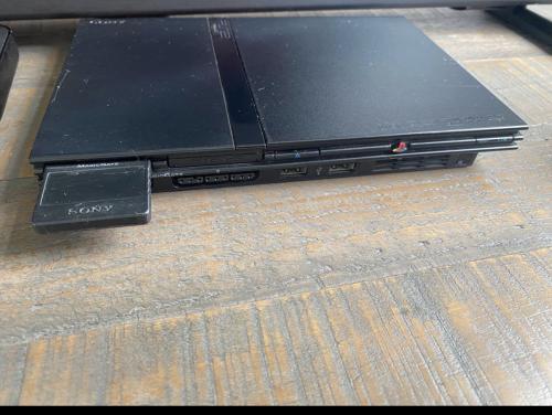 Ps2 met 2 consoles en games