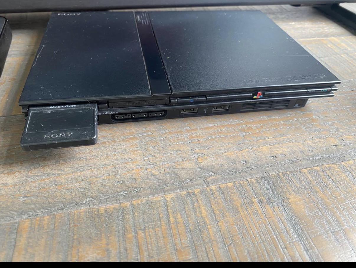 Ps2 met 2 consoles en games