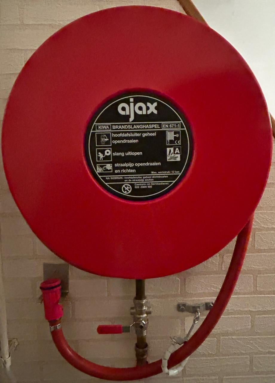 Te koop : Brandslang van Ajax op haspel