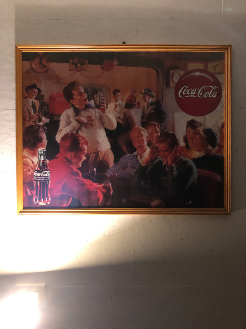 Leuke poster ingelijst achter ontspiegeld.