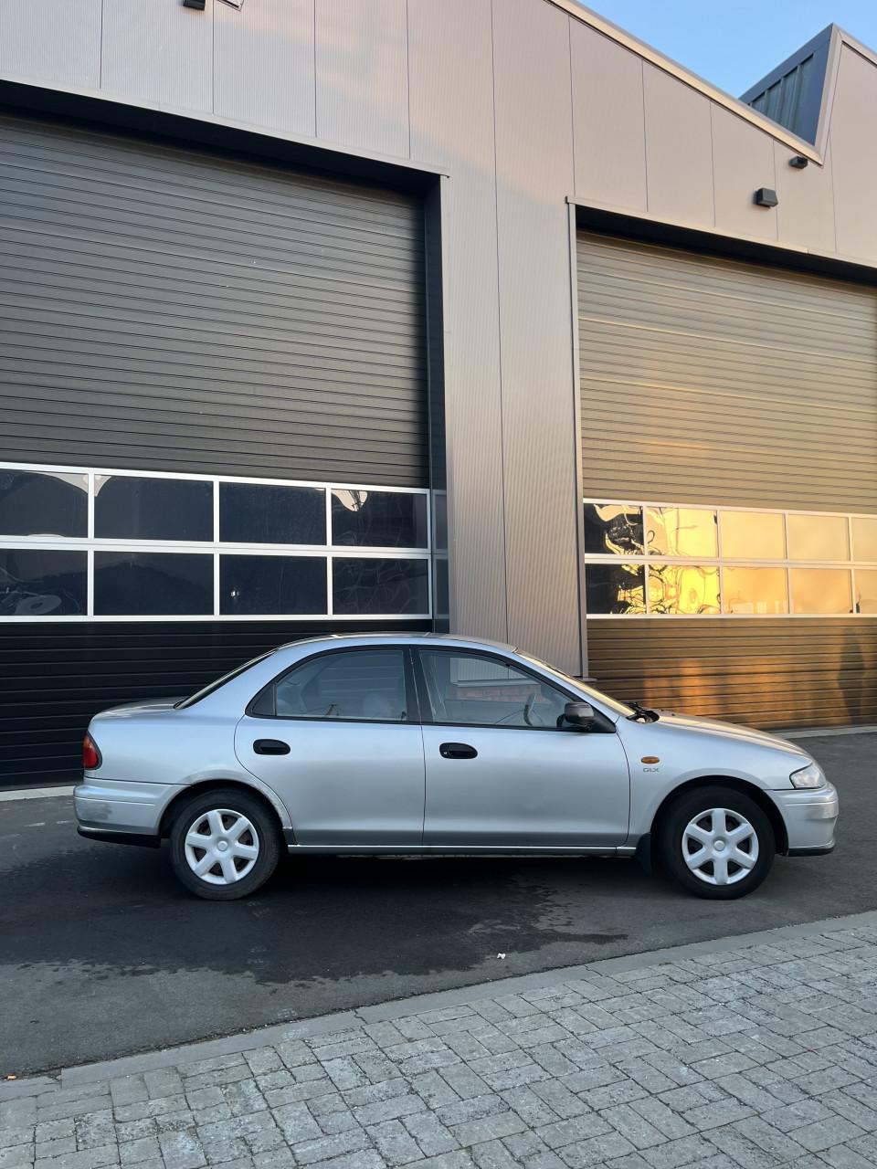 Mazda 323 1.5 SDN LX 1997 Grijs