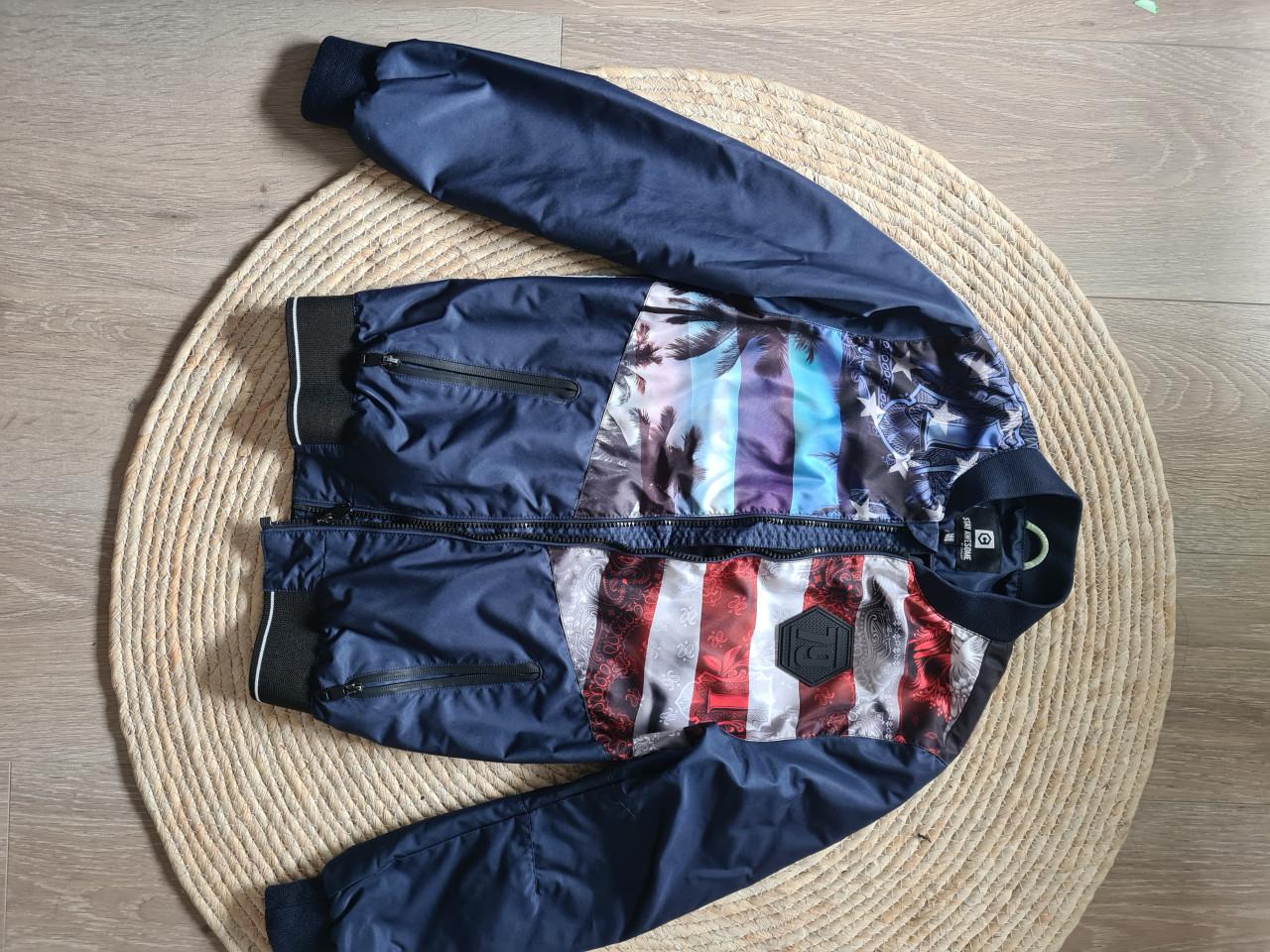 Nieuwe tussenjas jongens maat 146/152