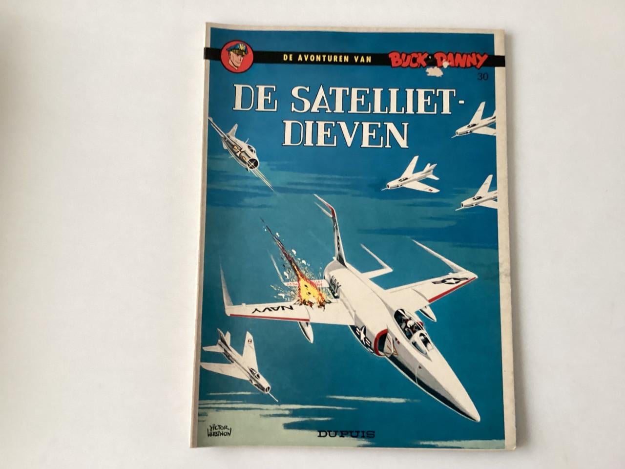 18 verschillende stripboekjes met de avonturen van Buck Danny.