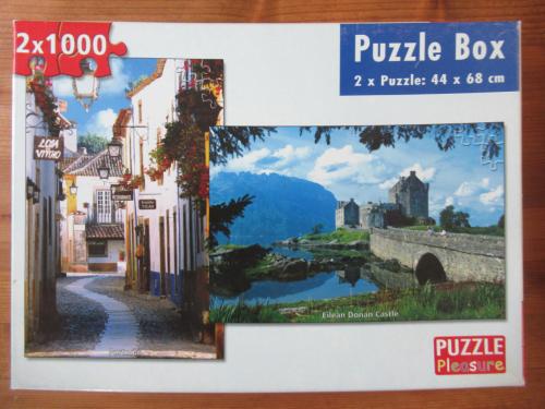 Doos met 2 leuke volledige puzzels van 1000 stukjes, zgan