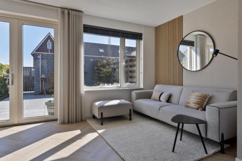 Design sofa 3,5 zits xooon prizzi + poef